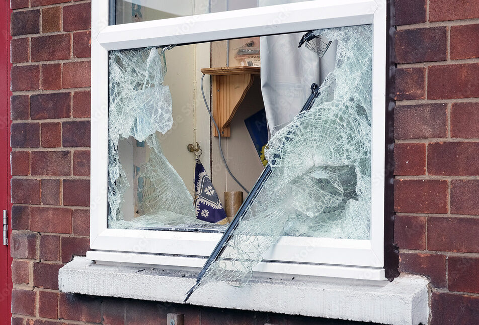 Home Broken window caused by burglar breaking in to premisis to steal.